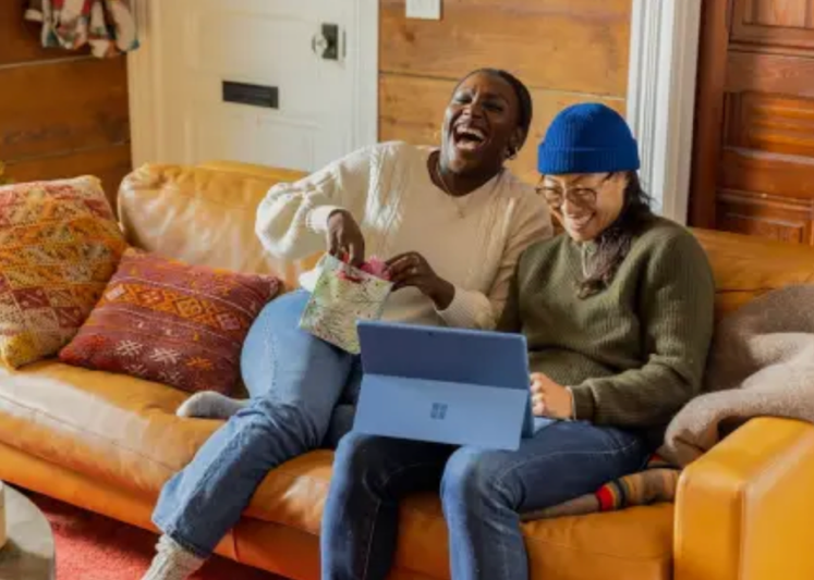 Students laughing together during an online lesson