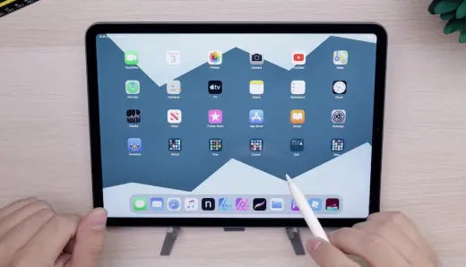 Learner choosing digital study resources on a tablet